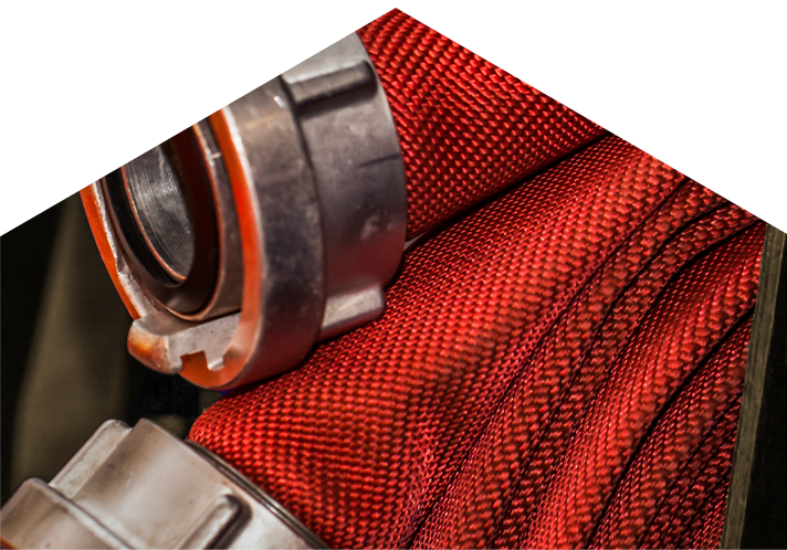 Closeup of red fire hoses